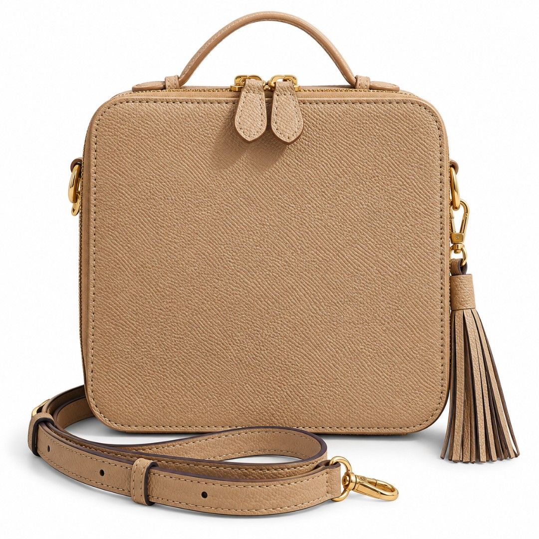 Box Crossbody Bag with Tassel (Category: Cross-body Bags) located in Quezon City. Submitted by gorgeousvixen051893 (Listing ID 1465343924, Image 1). Description: - Brand: Korean Brand - Material: SAND PINK saffiano leather with gold-tone hardware - Closure: Dual zip top closure - Straps: Top handle and detachable/adjustable shoulder strap - Accent: Chic side tassel charm - Interior: Vibrant blue and orange floral print lining with 1 slip pocket a