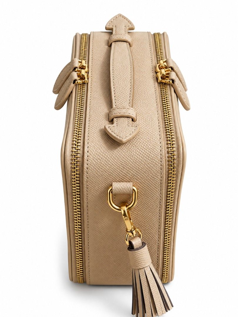 Box Crossbody Bag with Tassel (Category: Cross-body Bags) located in Quezon City. Submitted by gorgeousvixen051893 (Listing ID 1465343924, Image 2). Description: - Brand: Korean Brand - Material: SAND PINK saffiano leather with gold-tone hardware - Closure: Dual zip top closure - Straps: Top handle and detachable/adjustable shoulder strap - Accent: Chic side tassel charm - Interior: Vibrant blue and orange floral print lining with 1 slip pocket a