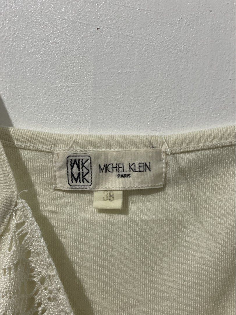 Michel Klein White Cami Top (Category: Sleeveless) located in Tuguegarao City. Submitted by ziggerryy (Listing ID 1465370466, Image 3). Description: No flaws. No holes S-M .