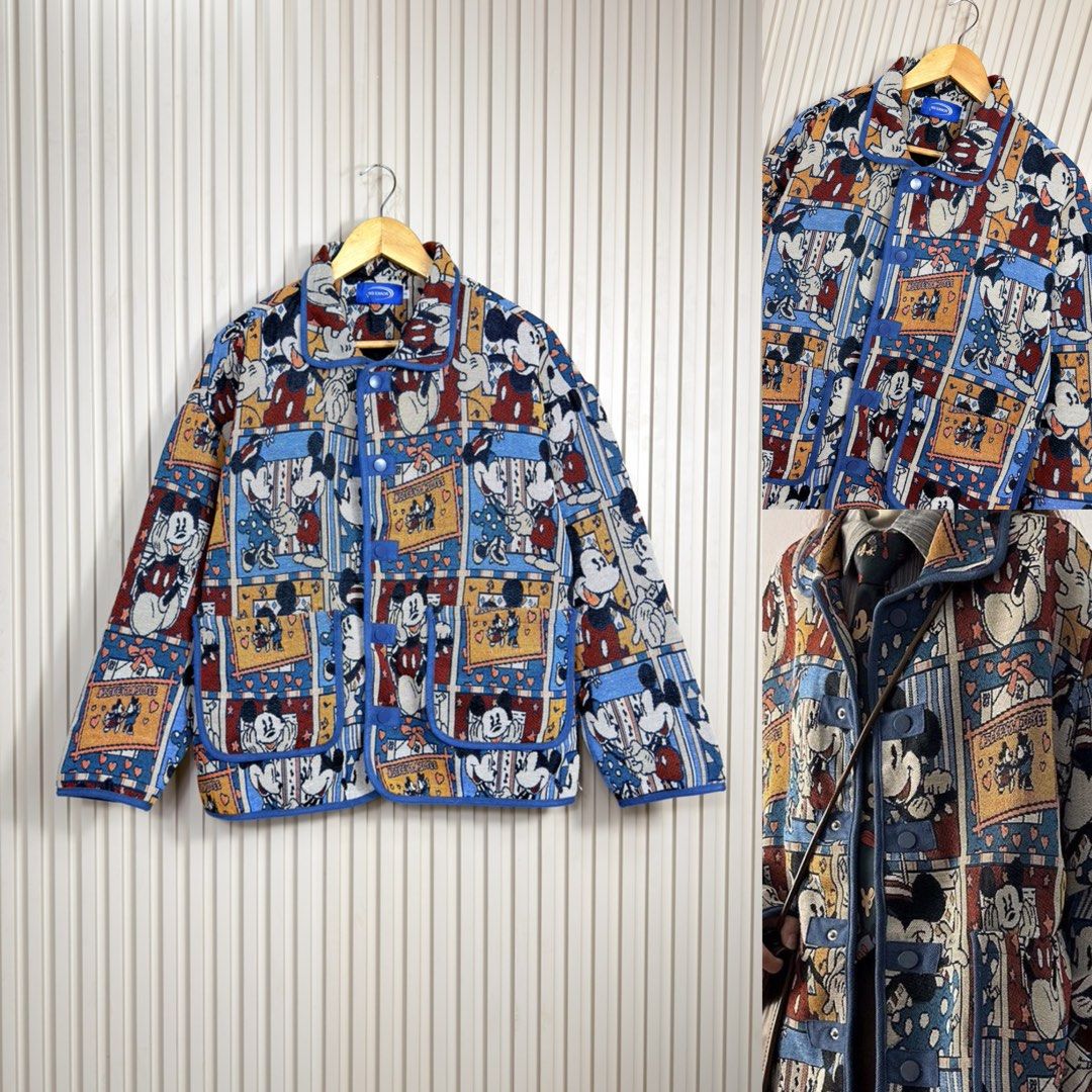 Mickey Mouse Tapestry Pattern Button Up Jacket (Category: Coats, Jackets and Outerwear) located in Pasig City. Submitted by trendapparelph (Listing ID 1465257559, Image 1). Description: - Eye-catching retro Mickey Mouse tapestry design in blue, red, and yellow - Textured woven fabric featuring vintage cartoon graphics - Classic collar with front button closure - Practical front pockets with matching trim - Perfect statement jacket for everyday st