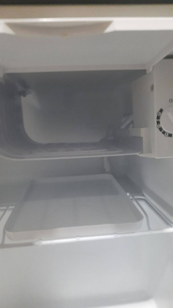 Mini Refrigerator (Category: Refrigerators and Freezers) located in Caloocan City. Submitted by mellowaaain (Listing ID 1465328340, Image 3). Description: bought last February 2026. no issues, like new. originally, P6k. rfs: decluttering and have bigger ref. - have divider for drinks and freezer - very spacious inclusions: box, unit MOD: J&T/LalaMove.