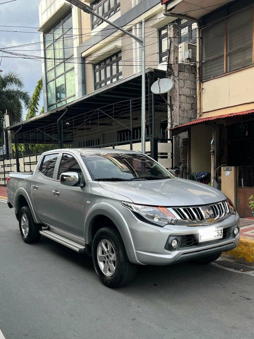 Mitsubishi Strada GLX V Auto (Category: Used Cars) located in Makati City. Submitted by mike755 (Listing ID 1465305544, Image 1). Description: Color: Silver -Odometer: 83k km -2477 cc Turbo intercooler VGT 4x2 178PS 400NM 5AT Italian Synthetic Leather Seats from MG Square Changed oil fully synthetic, ATF, gear oil. Changed rear shocks, Yokohama GeolandarTires at 85%. Chnaged timing belt and related accesories New Battery With rear cover and bed c