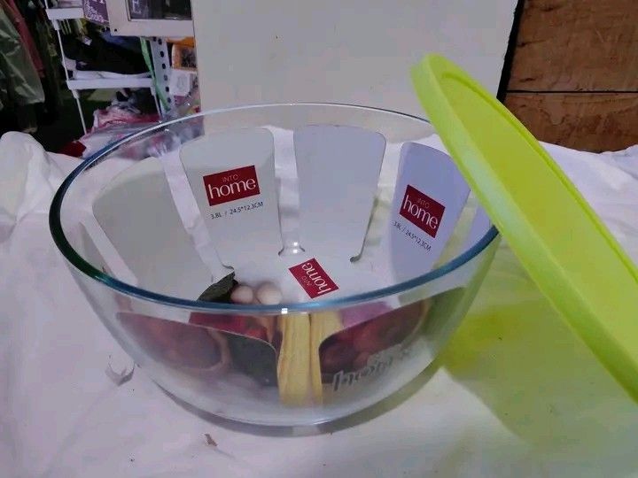 Mixing bowl (Category: Other Kitchen Appliances) located in Manila. Submitted by rubymielbona (Listing ID 1465173072, Image 1). Description: - Brand: Into Home - Type: Glass mixing bowl with lid - Capacity: 3.8L - Dimensions: 24.5 x 12.3 cm - Color: Clear glass with lime green lid - Condition: Brand new with tags/inserts - Ideal for baking, food prep, mixing ingredients, and fridge storage -Mixing bowl with cover sale 380‼️‼️.