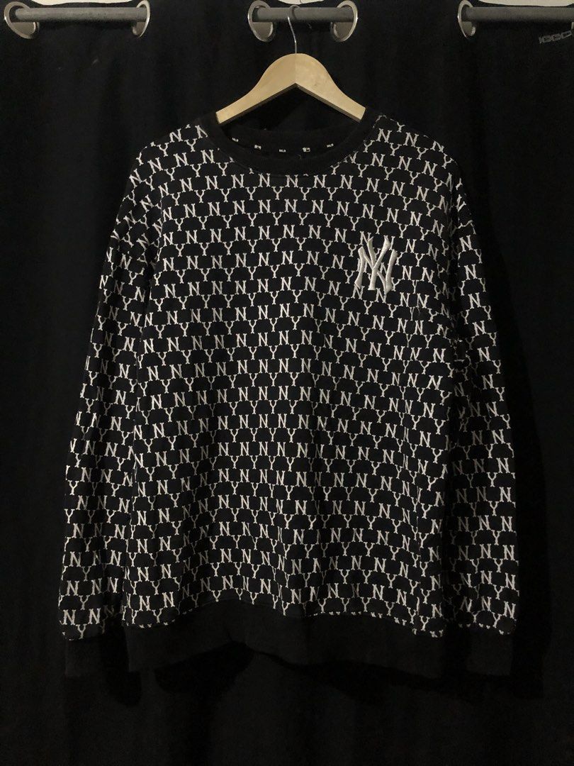 MLB New York Yankees Monogram Print Sweatshirt (Category: Coats, Jackets and Outerwear) located in Quezon City. Submitted by yeahsource222 (Listing ID 1465206972, Image 1). Description: - Authentic MLB New York Yankees merchandise - Sleek black color with all-over white NY monogram pattern - Classic embroidered logo on the chest - Comfortable ribbed collar, cuffs, and hem - Soft and durable cotton-polyester blend - Perfect for casual streetwear a