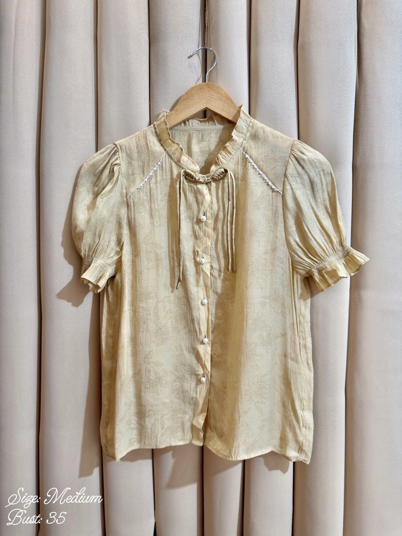 Modern Chinoiserie (Category: Blouses) located in Manila. Submitted by glamstylemnl (Listing ID 1465295596, Image 1). Description: ♡ SIZE: Medium ♡ BUST: 35 ♡ Swipe left to see the actual color & details ♡ lettuce-trim / puff sleeves ♡ HQ • 10/10 ♡ Ready to wear 👚.