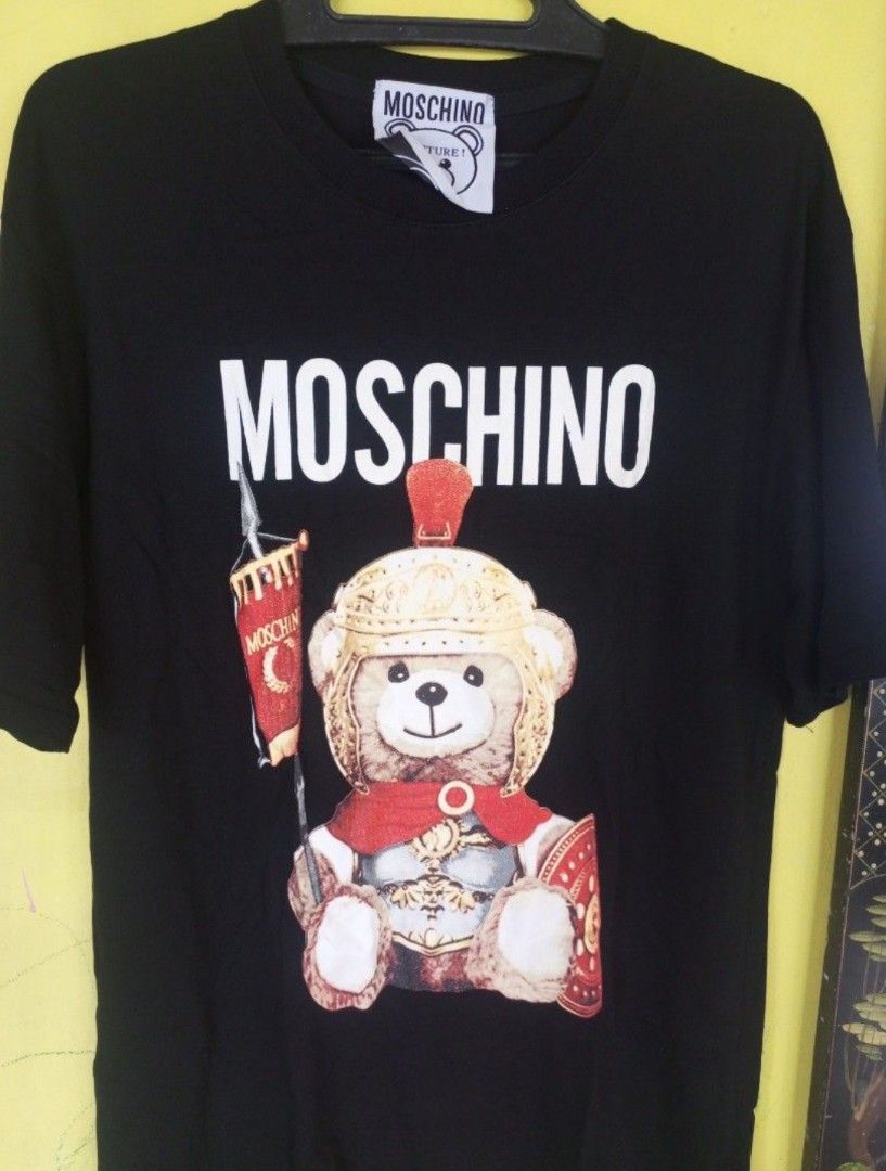 Moschino Black Tshirt Dress Size: Medium (Category: Shirts) located in Navotas City. Submitted by vanilla_sandalwood (Listing ID 1465269593, Image 3). Description: -Brand: Moschino -Color: Black -Size: Medium -Good condition -Like New.