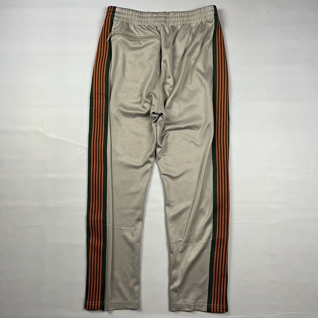 Needles x AIPL - Track Pants (Category: Joggers) located in Puerto Princesa. Submitted by something___. (Listing ID 1465344787, Image 2). Description: Needles x AIPL - Track Pants Tagged Size: Small Dimensions Length: 37.5 Waist: 28-32 Inseam: 13.5 Leg Opening: 7.3 Condition: Excellent Color rate: 10 Flaws: Gently used.