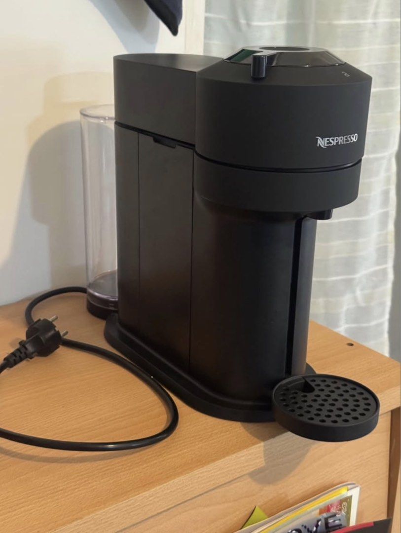 Nespresso Vertuo Next Coffee Machine in Matte Black (Category: Coffee Machines & Makers) located in Manila. Submitted by alykyam (Listing ID 1465228510, Image 2). Description: - Brand: Nespresso - Model: Vertuo Next - Color: Matte Black - Condition: Very good, well-maintained - Features: Modern minimalist design, easy-to-use capsule system, compact footprint ideal for home or office use - Inclusions: Main unit with water tank and drip tray as sho