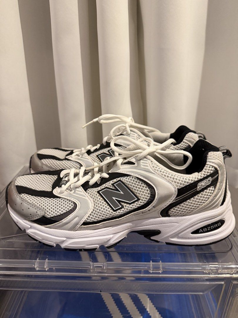 New Balance 530 White Silver Black (Category: Casual Shoes) located in Manila. Submitted by malcolm_169 (Listing ID 1465179996, Image 1). Description: - Brand: New Balance 530 - Colorway: White, Silver, and Black - Style: Chunky retro dad shoe / running style - Upper: Breathable mesh with metallic overlays - Comfort: ABZORB midsole cushioning for all-day wear - Details: Classic 'N' branding and '530' text near the collar - Condition: Clean laces 