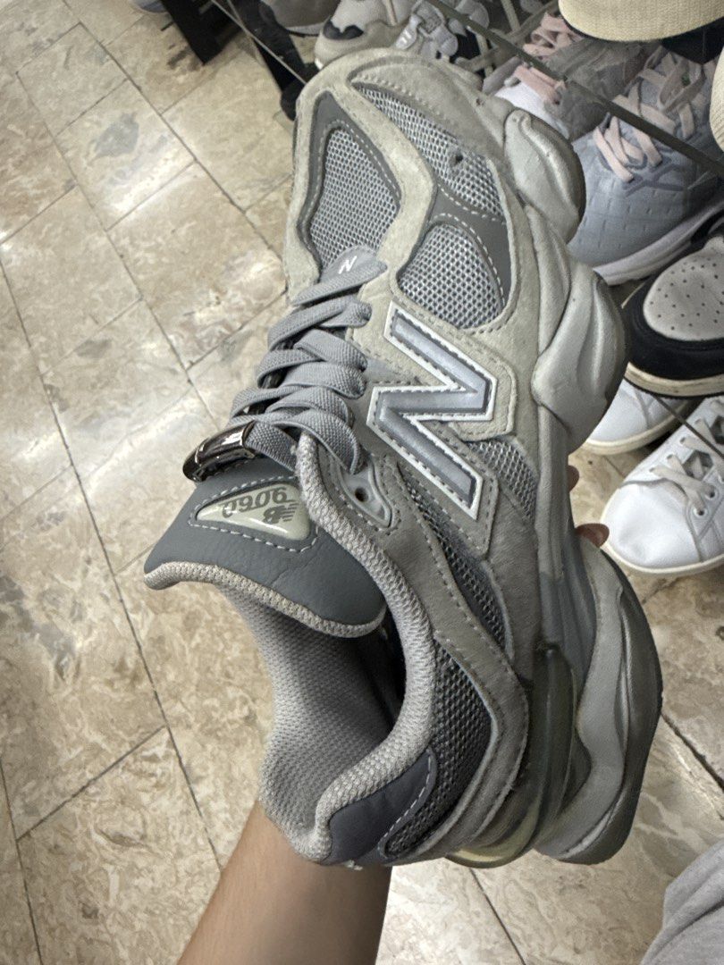 New Balance 9060 Grey Sneakers (Category: Sneakers) located in Abucay. Submitted by fastlion.584bdf (Listing ID 1465361866, Image 1). Description: - Model: New Balance 9060 - Colorway: Classic Grey - Material: Premium mesh and suede upper panels - Accessory: Includes attached lace lock - Condition: Heavy wear and scuffs on foam midsole, outsole, and heel blocks (priced accordingly) - Branding: Standard New Balance tongue and heel details.