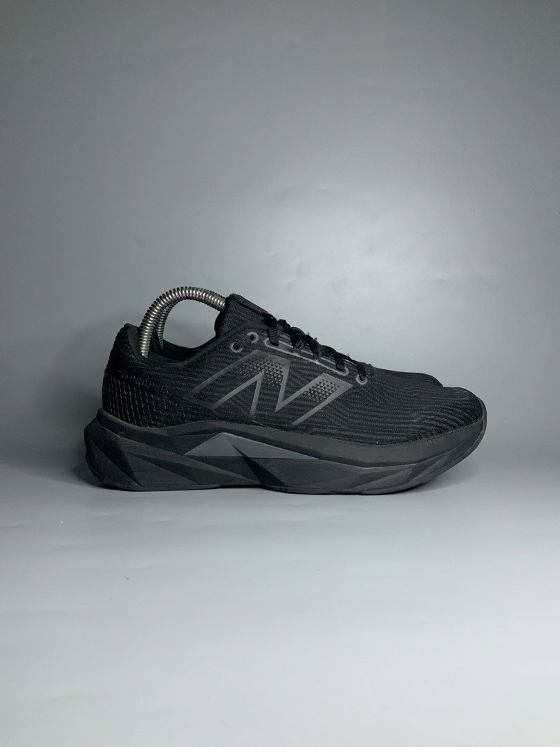 New Balance FuelCell Propel v4 (Category: Sneakers) located in Cavite. Submitted by kalye_footwear (Listing ID 1465333634, Image 2). Description: - Brand: New Balance - Model: FuelCell Propel v4 - Size 8.5 , Euro 40 , Cm 25.5 - Color: Black (with grey sole accents and light green inner lining) - Features: Comfortable, lightweight - Ideal for: Running, everyday wear - Includes: Shoe trees .