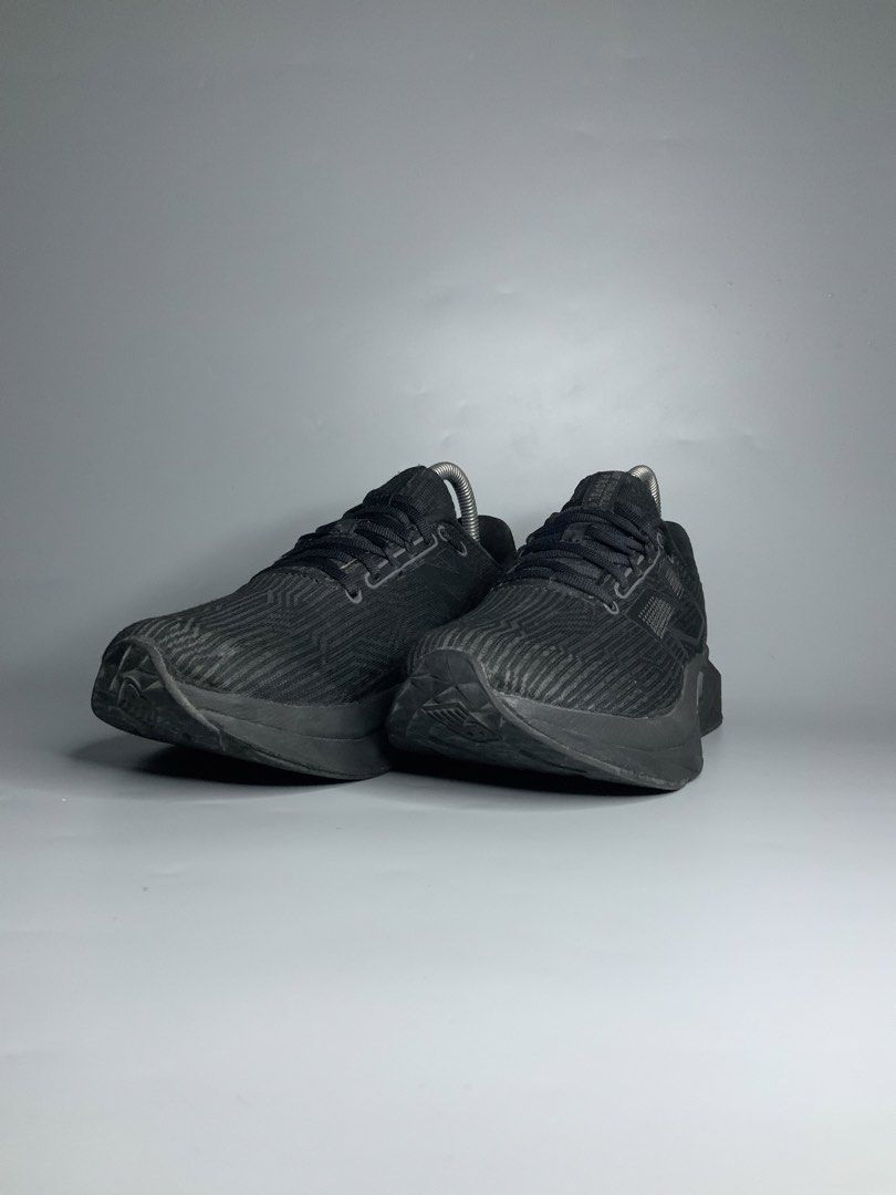 New Balance FuelCell Propel v4 (Category: Sneakers) located in Cavite. Submitted by kalye_footwear (Listing ID 1465333634, Image 3). Description: - Brand: New Balance - Model: FuelCell Propel v4 - Size 8.5 , Euro 40 , Cm 25.5 - Color: Black (with grey sole accents and light green inner lining) - Features: Comfortable, lightweight - Ideal for: Running, everyday wear - Includes: Shoe trees .