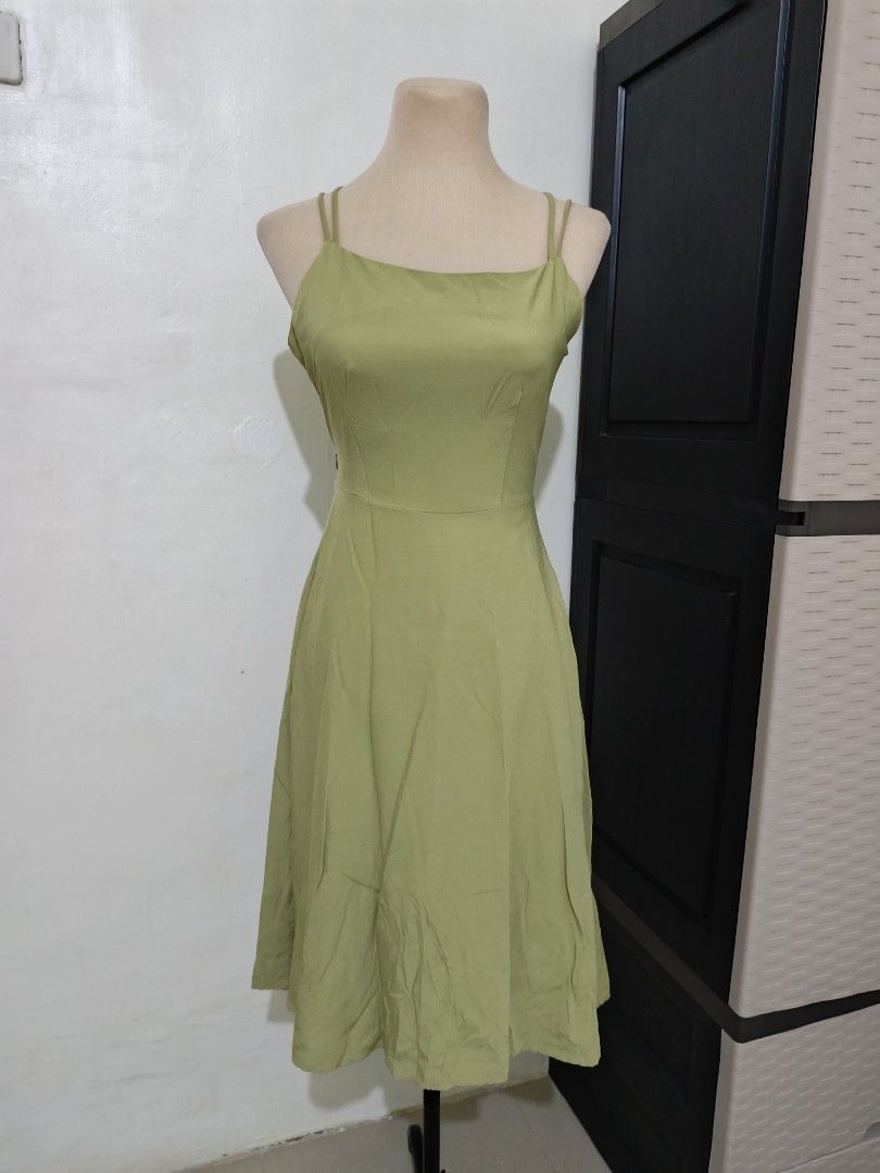 Nice Park Green Spaghetti Strap Midi Dress (Category: Dresses) located in Cabanatuan. Submitted by lyxyx (Listing ID 1465308874, Image 1). Description: - Brand: Nice Park - Color: Green - Size: S - Design: Double spaghetti straps, straight neckline, fitted waist, and flared skirt silhouette - Closure: Convenient side zipper - Material: Smooth woven fabric - Perfect for: Casual outings, dates, and daytime events.