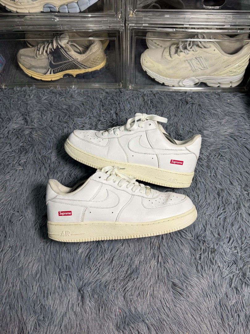 NIKE AF1 X SUPREME LOW TRIPLE WHITE (Category: Sneakers) located in Candelaria. Submitted by worn_gallerie (Listing ID 1465291104, Image 1). Description: NIKE AF1 SUPREME SIZE 11 US MENS GOOD CONDITION NEEDS CLEAN ₱1,899 ONLY.