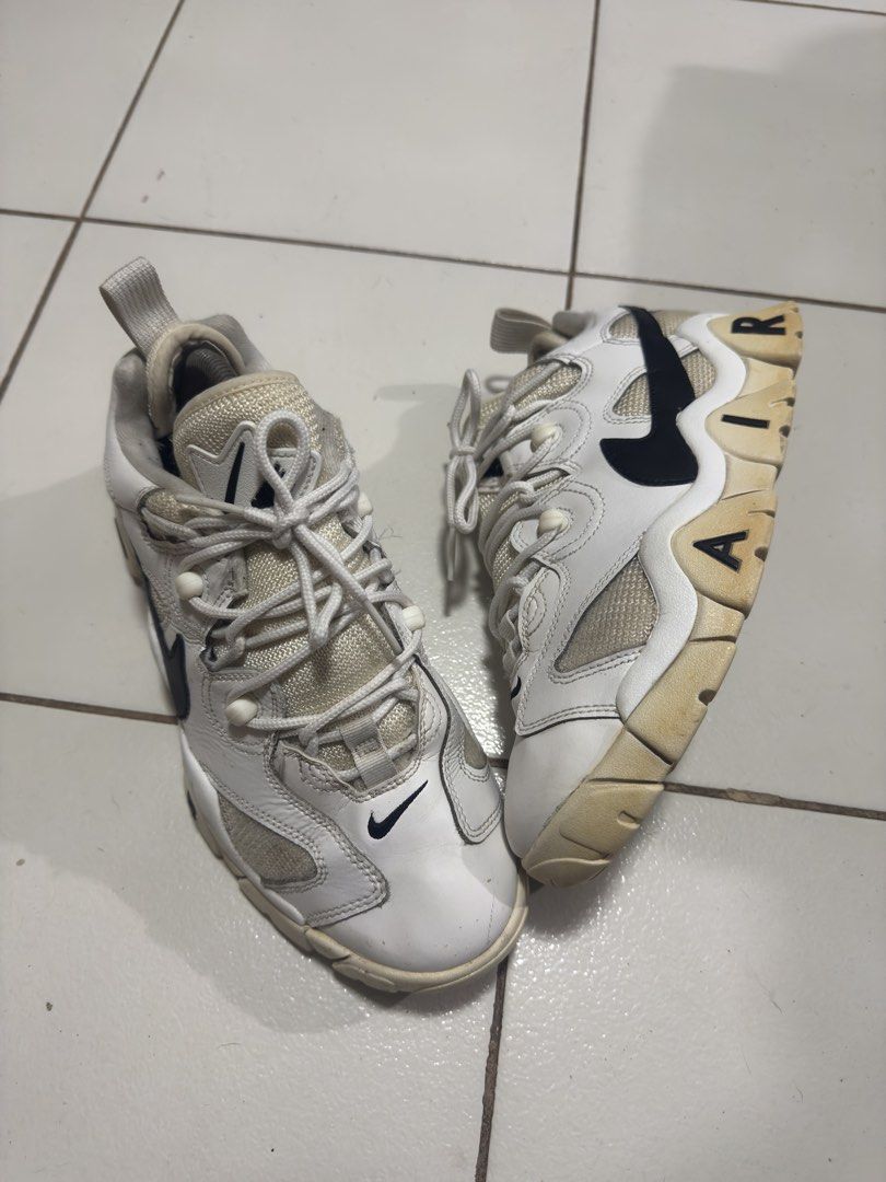Nike Air Barrage Low White Black (Category: Sneakers) located in Manila. Submitted by mislangers_stuff (Listing ID 1465267961, Image 3). Description: - Brand: Nike Air Barrage Low - Colorway: White leather with black branding and chunky sole - Design: Distinctive embossed AIR lettering and lace-up cord loops - Condition: Visible yellowing on soles due to age and regular wear - Outsole: Grippy rubber with plenty of tread left - Perfect for: Street