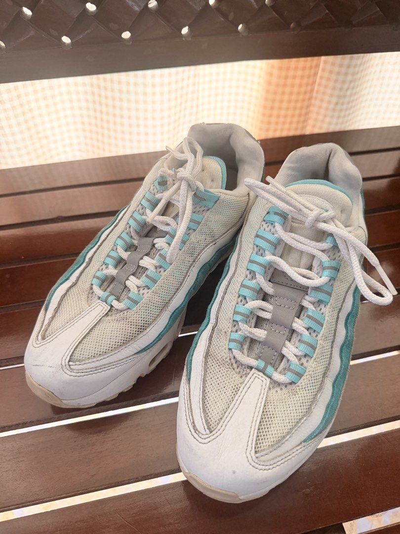 Nike Air Max 95 White and Turquoise (Category: Sneakers) located in Manila. Submitted by sedpuprincess (Listing ID 1465306072, Image 2). Description: - Authentic Nike Air Max 95 sneakers - Clean white and turquoise colorway - Mesh and leather upper with signature wave design - Features classic visible Air units in the midsole - Size tag is readable inside - Condition: Worn a few times with minor signs of wear on soles and uppers.