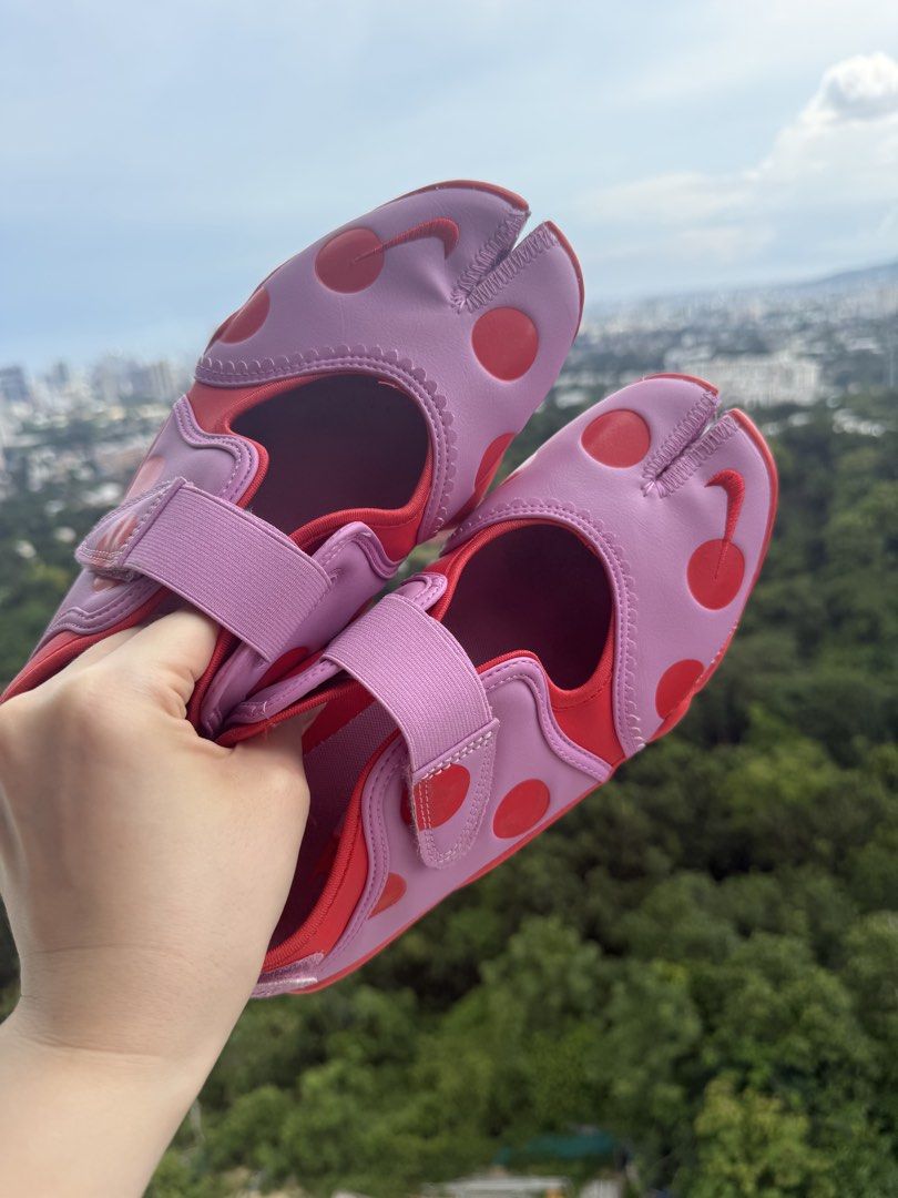 Nike Air Rift Dot Pink Red Split Toe Sneakers (Category: Sneakers) located in Cebu City. Submitted by irinaivyj (Listing ID 1465214447, Image 2). Description: - Brand: Nike Air Rift - Style: Split-toe / Tabi silhouette - Colorway: Pink and red with playful polka dots - Size: US 9 / UK 6.5 / EUR 40.5 - Features: Strap closure, chunky rubber sole with Air cushioning - Condition: Clean uppers and insoles, well-maintained - Perfect statement sneakers