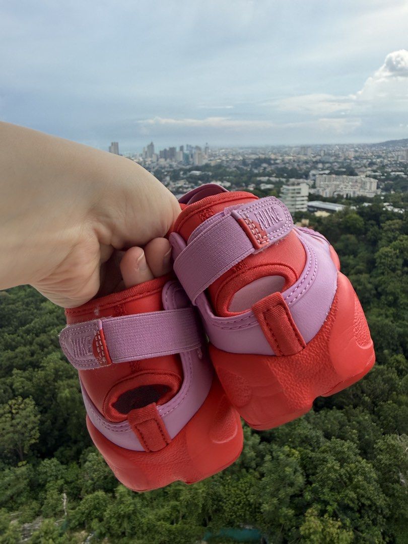 Nike Air Rift Dot Pink Red Split Toe Sneakers (Category: Sneakers) located in Cebu City. Submitted by irinaivyj (Listing ID 1465214447, Image 3). Description: - Brand: Nike Air Rift - Style: Split-toe / Tabi silhouette - Colorway: Pink and red with playful polka dots - Size: US 9 / UK 6.5 / EUR 40.5 - Features: Strap closure, chunky rubber sole with Air cushioning - Condition: Clean uppers and insoles, well-maintained - Perfect statement sneakers