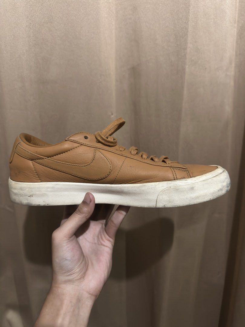 Nike Blazer Low VNTG Tan Leather Sneakers (Category: Sneakers) located in Quezon City. Submitted by bebe0827 (Listing ID 1465300751, Image 3). Description: - Brand: Nike Blazer Low - Color: Tan leather with matching brown laces and classic side swoosh - Condition: Good everyday pair with natural grain texture on the leather; white rubber midsole has minor scuffs from regular use - Style: Clean monochrome look, perfect for casual daily wear.