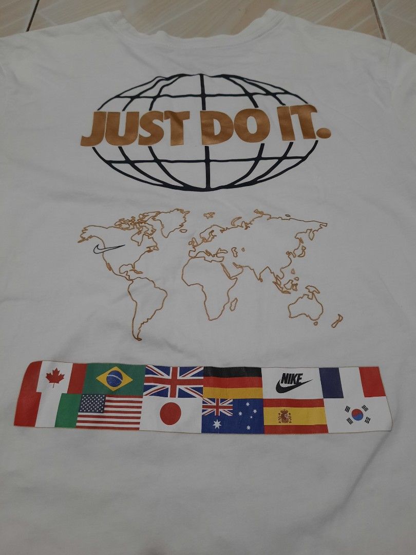 nike country graphic shirt (Category: Tshirts & Polo Shirts ) located in Tarlac. Submitted by thryftstash (Listing ID 1465349823, Image 2). Description: dimes: 26 - 18.5 M on tag issue: last pic (minimal cracks) sf not included tarlac loc j&t and lbc courier.