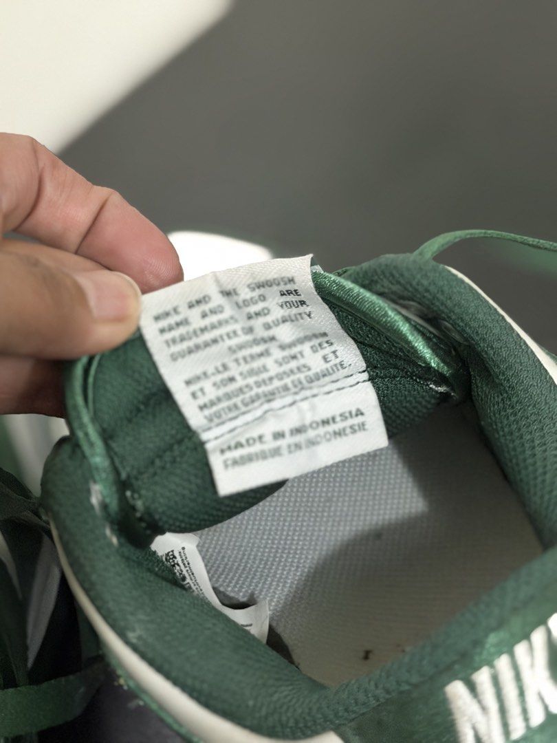 Nike Dunk Low Satin Green White Sneakers (Category: Sneakers) located in Pasig City. Submitted by momfinds23 (Listing ID 1465194738, Image 3). Description: - Model: Nike Dunk Low - Colorway: Green and White - Material: Unique glossy satin upper - Size: UK 3.5 / EUR 36.5 - Product Code: DX5931-100 - Condition: Brand new with box - Mode of Payment: Gcash / BPI / COD via shipping - Shipping: Same-day delivery available within Metro Manila.