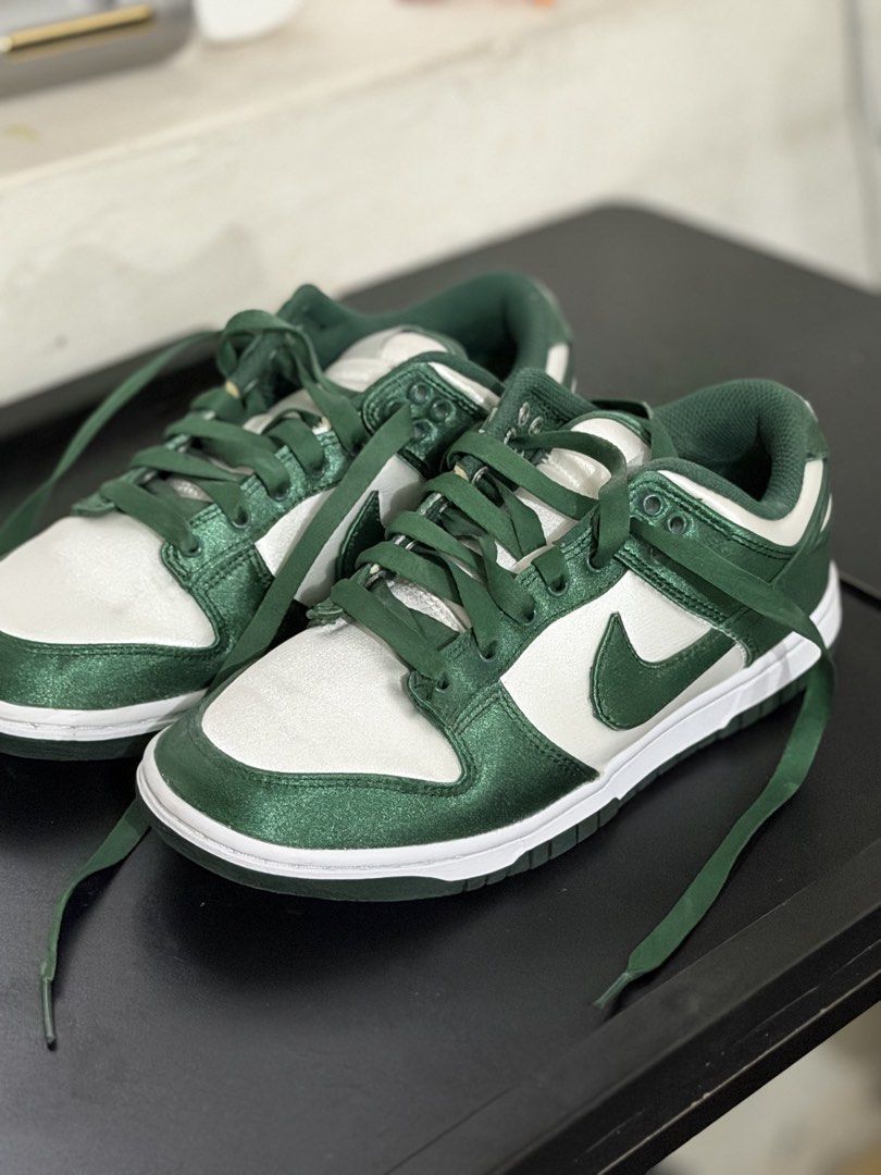 Nike Dunk Low Satin Green White Sneakers (Category: Sneakers) located in Pasig City. Submitted by momfinds23 (Listing ID 1465194738, Image 1). Description: - Model: Nike Dunk Low - Colorway: Green and White - Material: Unique glossy satin upper - Size: UK 3.5 / EUR 36.5 - Product Code: DX5931-100 - Condition: Brand new with box - Mode of Payment: Gcash / BPI / COD via shipping - Shipping: Same-day delivery available within Metro Manila.