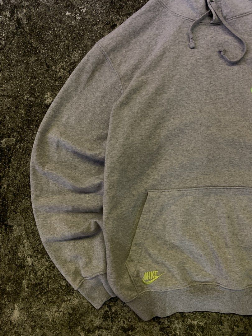 Nike Grey Hoodie with Multi-Color Logo (Category: Hoodies) located in Manila. Submitted by loyspalencia (Listing ID 1465263483, Image 2). Description: - Grey Nike hoodie - Multi-color embroidered Nike logo on chest - Small neon green Nike logo on left hem - Small embroidered Nike logo on hood - Kangaroo pocket - Drawstring hood - Dimes: W-25 / L-27 / Sleeves- 24 - Size: Meduim cut tags - Execellent Condition.