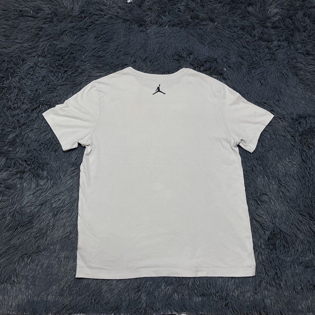 Nike Jordan Graphic Tee White Size XL (Category: Tshirts & Polo Shirts ) located in Batangas. Submitted by jaylord_g (Listing ID 1465280070, Image 2). Description: - 22x27 - Large - Brand: Nike Jordan - Color: White - Size: XL - Material: 100% Cotton - Design: Colorful artistic sneaker and basketball graphic on chest, small Jumpman logo on upper back - Fit: Standard crew neck - Origin: Made in China.