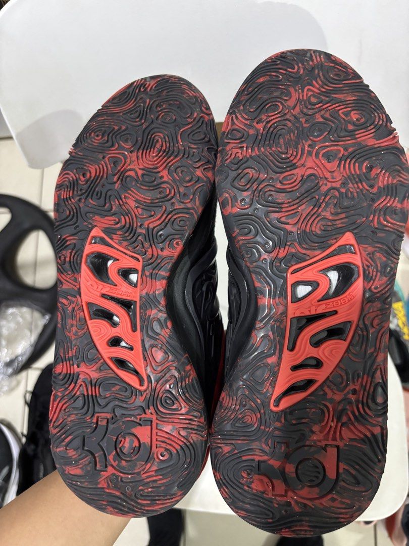 Nike KD 15 Bred Size 9 US (Category: Sneakers) located in Manila. Submitted by jonard2297 (Listing ID 1465205720, Image 3). Description: - Brand/Model: Nike KD 15 'Bred' (Black and Red colorway) - Size: Men's US 9 / UK 8 / EUR 42.5 - Cushioning & Support: Responsive Air Zoom cushioning with supportive molded overlays - Traction: Grippy patterned outsole with plenty of grip left for the court - Condition/Details: Clean knit upper with striking red
