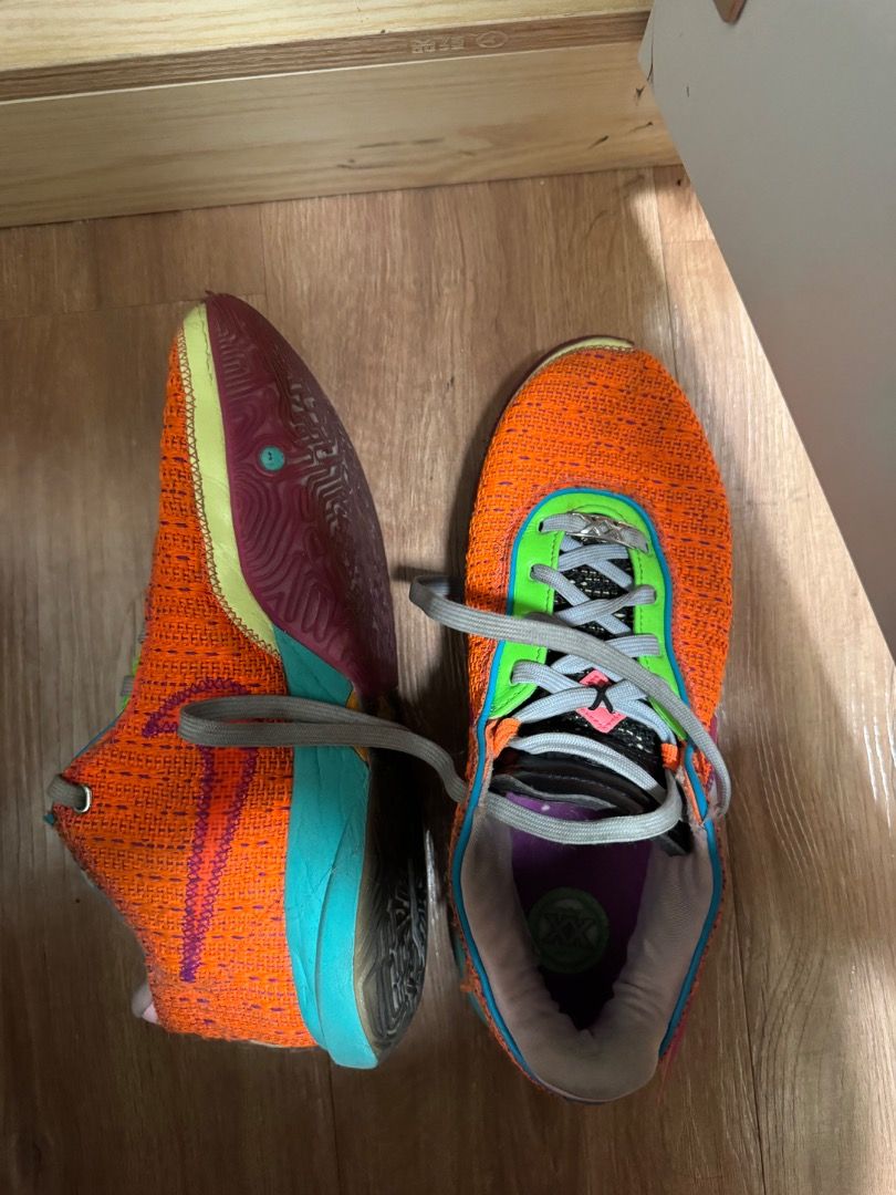 Nike LeBron 20 Orange (Category: Sneakers) located in Pasig City. Submitted by wwwww567 (Listing ID 1465374480, Image 2). Description: - Model: Nike LeBron XX "Time Machine" - Size: US 9.5 / UK 8.5 / EUR 43 - Colorway: Bright orange knit upper, green trim, purple insoles, and multi-color outsole - Features: Classic XX branding inside and top-tier on-court performance - Perfect for ballers looking for high-performance kicks at a fraction of the pr
