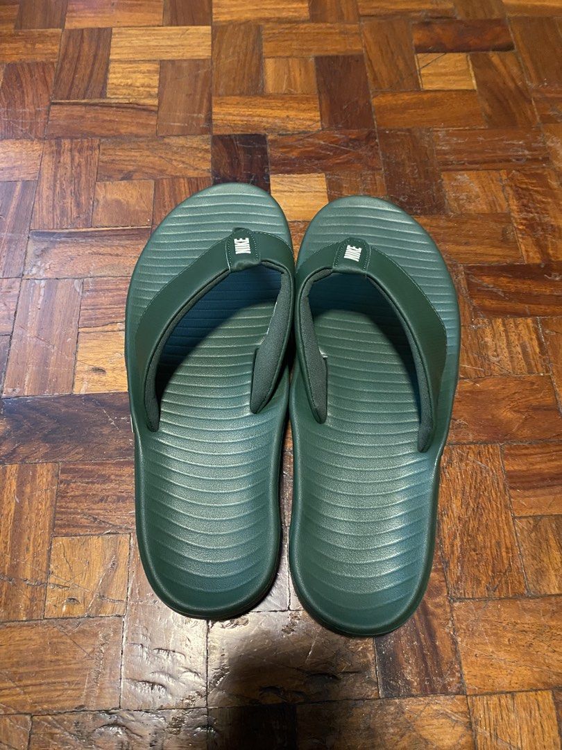 Nike Marina (Category: Slippers & Slides) located in Quezon City. Submitted by luigic34 (Listing ID 1465320515, Image 1). Description: Never used Nike Marina Size 10 Fir/Lt Khaki RFS: Wrong Size.