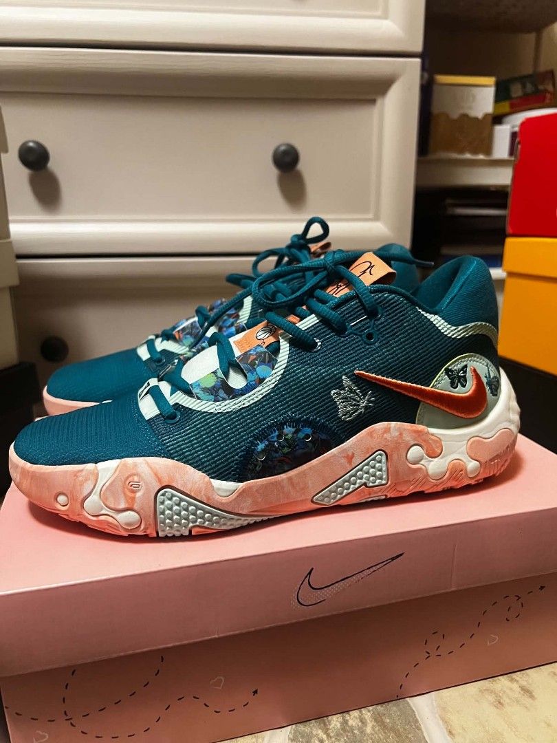 Nike PG 6 NRG EP “All-Star Weekend” (Category: Sneakers) located in Manila. Submitted by aeither (Listing ID 1465283596, Image 1). Description: - Colorway: Teal and orange with a stylish marble-patterned midsole - Design: Unique butterfly embroidery near the heel - Traction: Durable, textured rubber outsole - Packaging: Includes the original pink branded box.