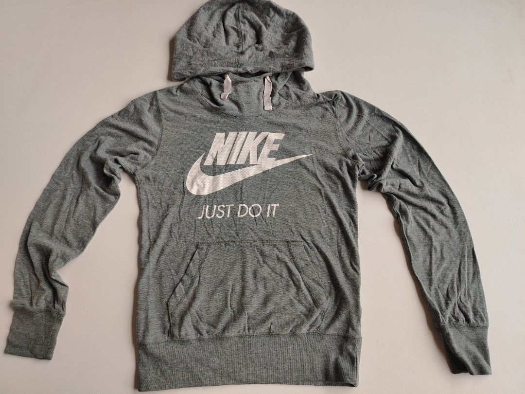Nike swoosh jacket (Category: Coats, Jackets and Outerwear) located in Manila. Submitted by rockandrolly (Listing ID 1465378271, Image 1). Description: 🏃 NIKE Lightweight Hoodie — S Classic Everyday Comfort ✅ Brand: Nike — 100% authentic ✅ Color: Heather gray — versatile & easy to match ✅ Size: Small — chest 21" / length 26" ✅ Fabric: Soft lightweight jersey — perfect for AC, travel, or mild weather ✅ Details: ✔️ Iconic Swoosh + "Just Do It" gra