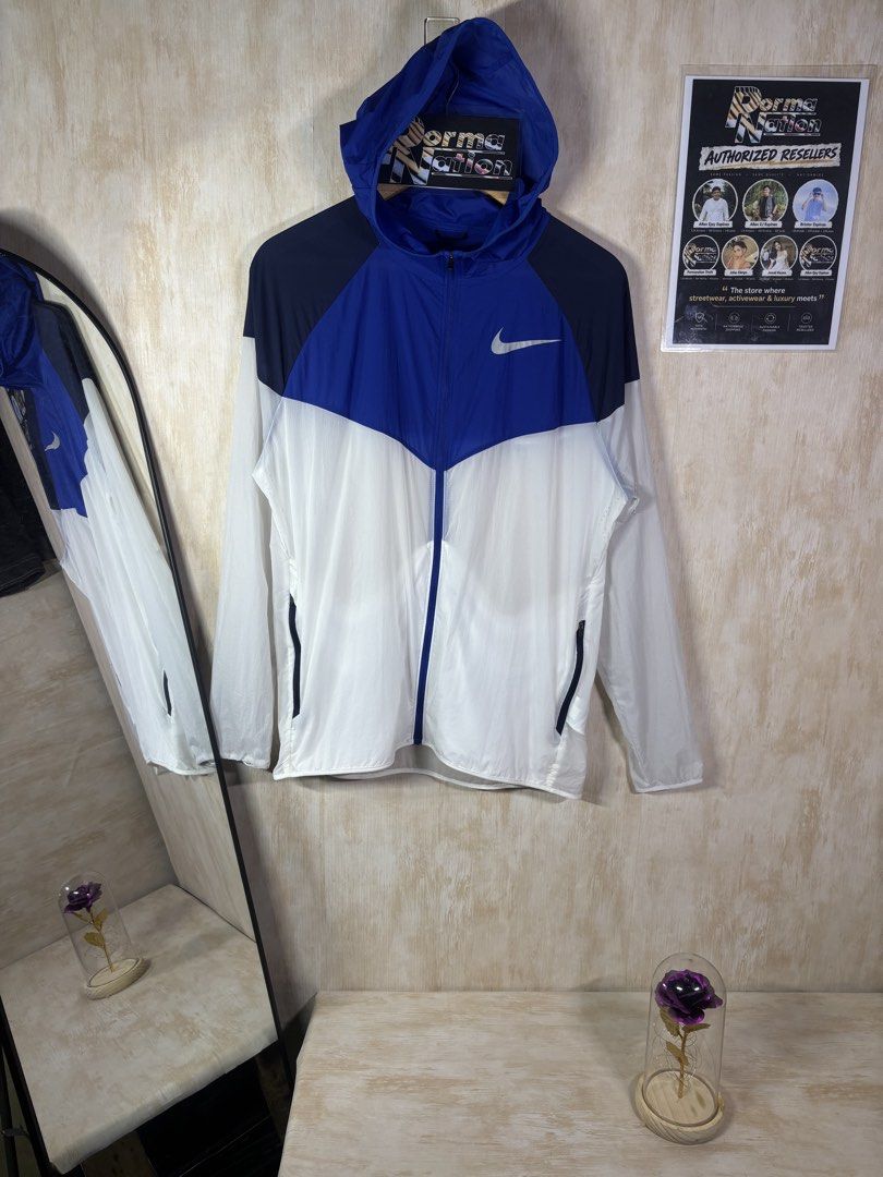 NIKE TWO TONE WINDRUNNER JACKET (Category: Coats, Jackets and Outerwear) located in Cabuyao City. Submitted by pormanation-thrift-store (Listing ID 1465193305, Image 1). Description: NIKE TWO TONE WINDRUNNER JACKET Condition: LIKE NEW Color rate: 10/10 (PWEDE SA MASELAN) Size: LARGE Dimes: 22”Wx28”L Issue: NONE❌ Price: 1500.