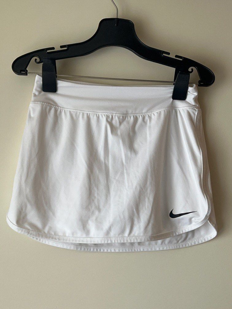 Nike white skort (Category: Activewear) located in Pasig City. Submitted by sandace (Listing ID 1465176885, Image 1). Description: Authentic Waist laid flat 12-12.5” Length 12”.