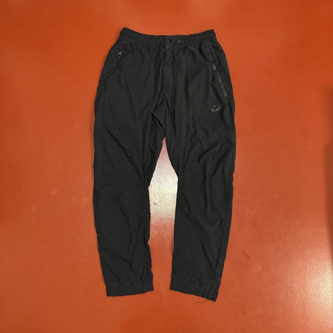 NIKE WOVEN PANTS (Category: Trousers) located in Pasig City. Submitted by buzzthrifty (Listing ID 1465308715, Image 1). Description: SIZE 28-32WAIST 36" LENGTH SIGNS OF USE LANG ALL GOODS PA .