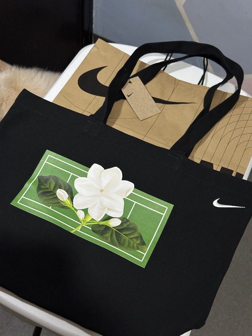 Nike x Alex Eala (Category: Tote Bags) located in Makati City. Submitted by yatche (Listing ID 1465218326, Image 3). Description: Nike By You x Alex Eala “In Full Bloom” Limited Edition Tote Bag A special-edition Nike tote inspired by Filipino tennis star Alex Eala. Featuring beautiful sampaguita floral artwork and tennis-inspired graphics, the design celebrates Alex’s Filipino heritage and her journey in the sport. Finished with the iconic Nike 