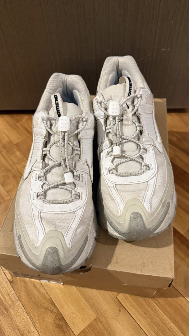 Nike Zoom Vomero Roam (Category: Sneakers) located in Taguig. Submitted by s.tree (Listing ID 1465341455, Image 2). Description: - Model: Nike Zoom Vomero Roam (White) - Original box included - Condition: Uppers have minor creasing and dirt from regular wear; inserts show normal wear.