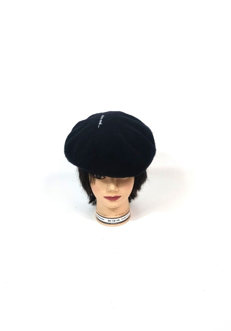 Niko and... Black Wool Beret Hat (Category: Caps & Hats) located in Manila. Submitted by callmetin (Listing ID 1465172597, Image 1). Description: - Brand: Niko and... - Color: Classic Black - Material: Soft wool - Details: White embroidered logo on the side - Condition: Clean inside and out, well-maintained - Styling: Perfect to pair with casual outfits, coats, or sweaters.