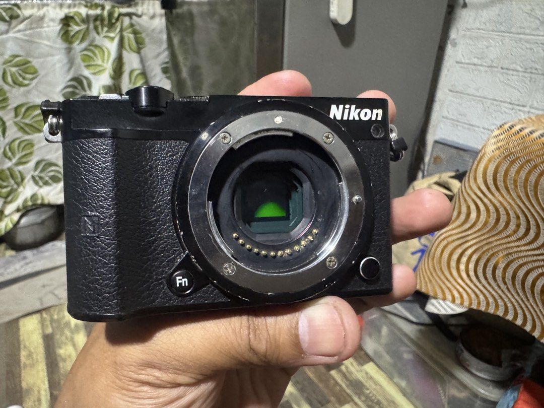 Nikon 1 J5 Mirrorless Digital Camera Body (Category: Cameras) located in Quezon City. Submitted by angace13 (Listing ID 1465209406, Image 3). Description: no lens battery (not included) hiniram lng para ma test ok touch ok flip screen ok lcd sale as is pm nlng lng salamat .