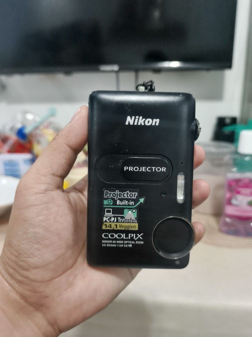 Nikon Coolpix S1200pj Built-in Projector (Category: Cameras) located in Manila. Submitted by jenmelvin001795 (Listing ID 1465324990, Image 2). Description: 👉 issue minor chip paint d nmn halata ✅14megapixel ✅projector ✅zoom in/ out ✅flash ✅all button working inclusion ✅original pouch ✅battery ✅strap ✅sd card .