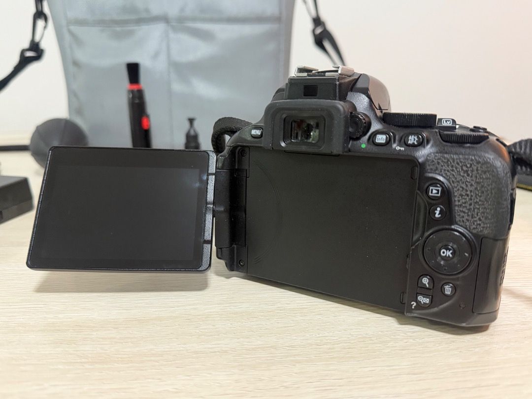 Nikon D5600 DSLR Camera Bundle with Bag and Accessories (Category: Cameras) located in Quezon City. Submitted by ikokia (Listing ID 1465315237, Image 3). Description: - Model: Nikon D5600 DSLR Camera - Lents Nikon 18-55mm - Shutter Count: 20,998 shots - Ideal starter kit for aspiring photographers and upgraders - Includes grey shoulder bag for easy transport - Comes with extra lens hoods - Includes battery charger - Maintenance tools included: ai