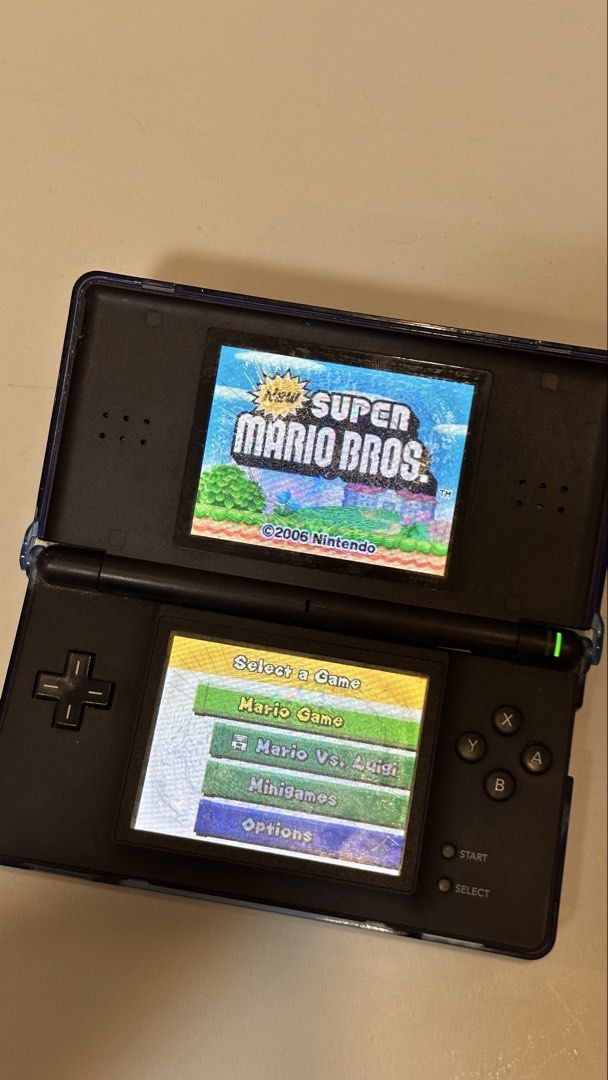 Nintendo Ds Lite (Category: Nintendo) located in Antipolo. Submitted by kieeeeth (Listing ID 1465380323, Image 2). Description: SELLING AS DEFECTIVE / FOR REPAIR Inclusions: • Nintendo DS Lite Unit with stylus • DS Lite AC Charger Working Condition: • Boots up and charges properly. • Slot-1 (DS cards) and Slot-2 (GBA cards) tested and 100% functional. • Sound, volume slider, charging port, and screen hinge work as intended. Disclosed Issues (As-I