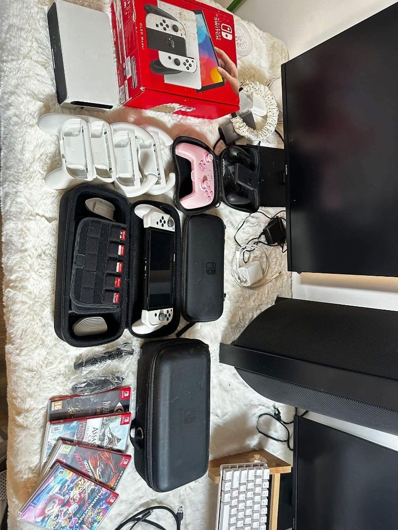 Nintendo Switch OLED White with Games and Accessories (Category: Nintendo) located in Manila. Submitted by swifttree-bd53 (Listing ID 1465226121, Image 1). Description: NINTENDO SWITCH OLED FULL SET — ₱18,000 TAKE ALL Selling my Nintendo Switch OLED bundle. Everything in the photos included. 🎮 5 Physical Games (all with orig packaging) • Mario Kart 8 Deluxe • Assassin's Creed • Need for Speed • Little Nightmares • The Legend of Zelda: Breath of 