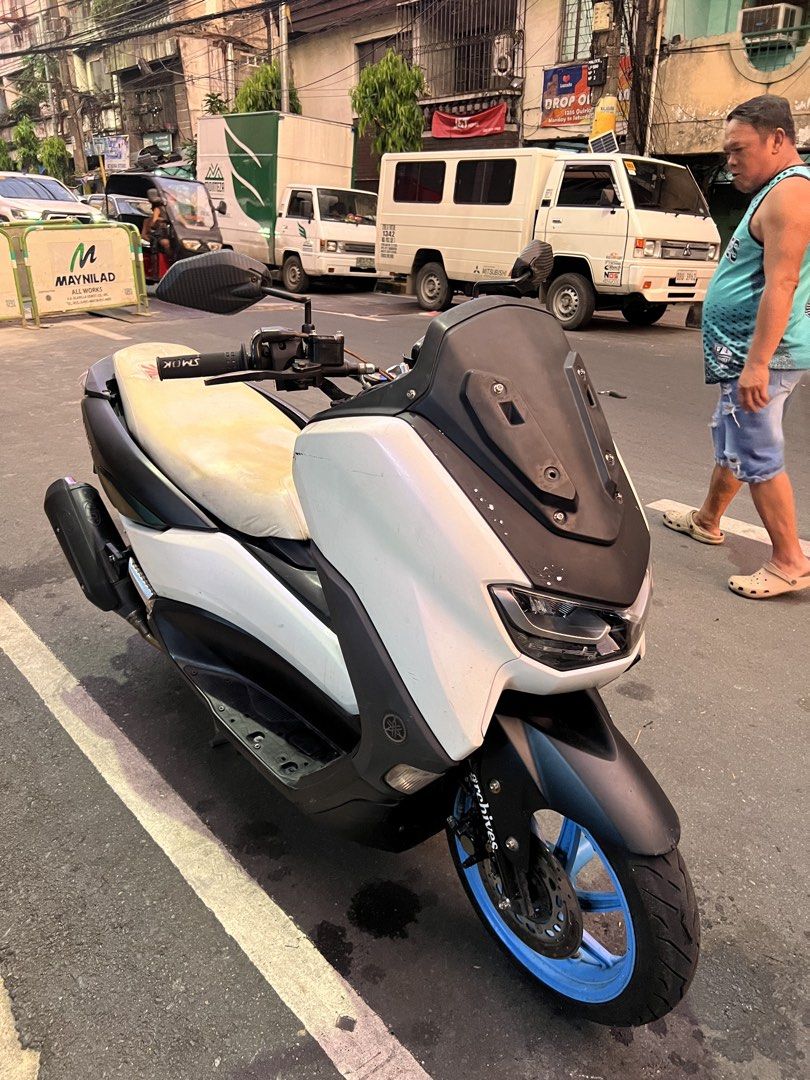 NMAX V2 ABS KEYLESS 2021 (Category: Motorbikes for Sale) located in Manila. Submitted by karlluigi_ (Listing ID 1465288962, Image 3). Description: NMAX V2 ABS KEYLESS 2021 model 33k odo all stock engine orig orcr lto plate open dos 1st owner valid id 3 signatures 1 remote, ubox key, red code Naked Handlebar Loud horn (Airhorn) JVT V3 PIPE GREN MAGS 80% white gold bolts Rear shock issue: color not indicated & unreg tondo/makati loc.