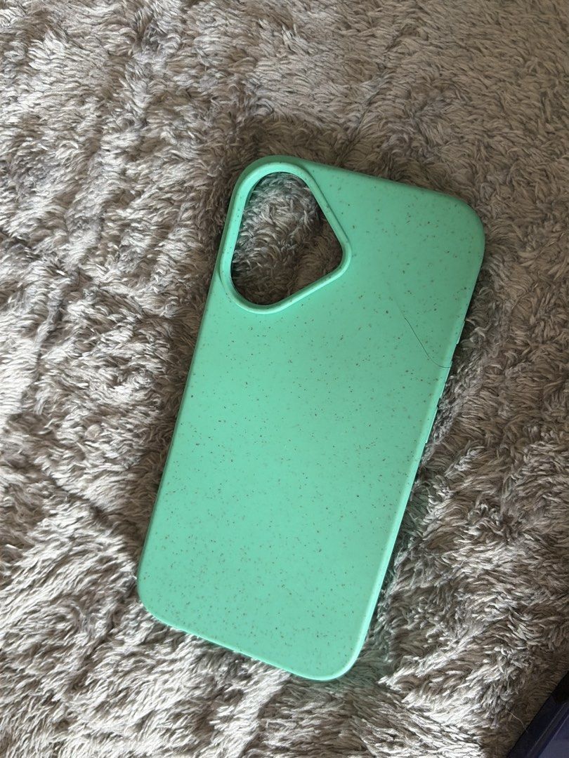 No brand (Category: Cases & Sleeves) located in Manila. Submitted by rich028 (Listing ID 1465224915, Image 1). Description: - Color: Mint green with speckled/textured design - Condition: Pre-owned, well-maintained - Style: Simple, sleek, unbranded phone case - Pickup location: Casiana Residence, 680 Quirino Tambo, Parañaque.