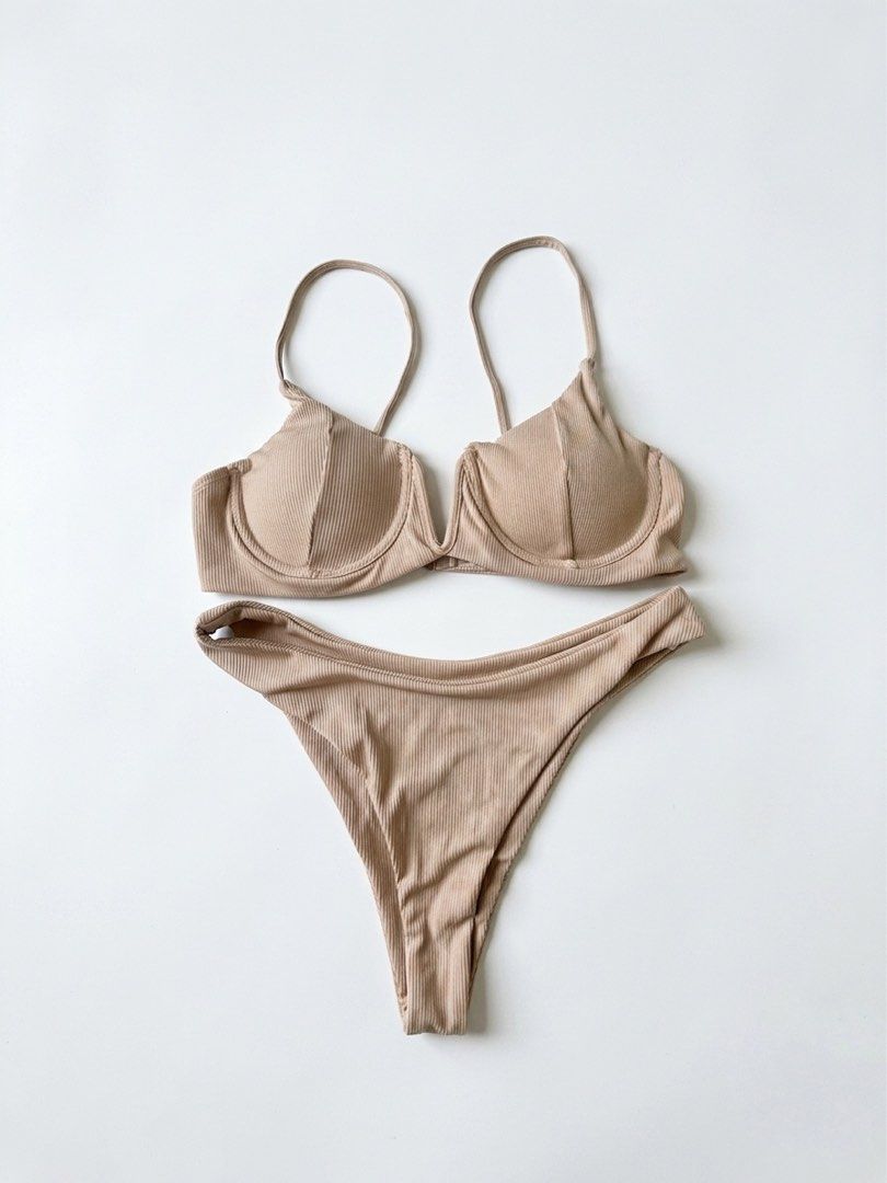 Nude ribbed underwire bikini set (Category: Bikinis & Swimsuits) located in Manila. Submitted by ynaamo (Listing ID 1465263563, Image 1). Description: - Style: Nude two-piece bikini set with textured ribbed fabric - Support: Underwire bra cups for solid support - Bottoms: Matching high-cut style with thin side straps - Color: Minimalist solid beige (goes with everything) - Condition: Clean fabric, zero wear, ready for your getaway.
