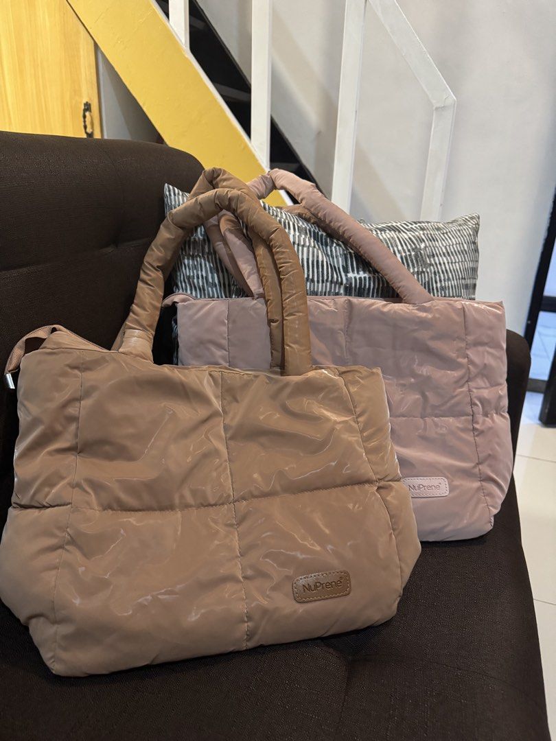 Nuprene Tote Bag (Category: Tote Bags) located in Caloocan City. Submitted by aeslaehc (Listing ID 1465325440, Image 1). Description: Nupre Floofa Puffer Tote Available in Rose Gold and Brown color > In good condition > Can fit ipad pro 11 inches, yellowpad, and aquaflask > Has two compartments & zipper inside Take all for 500 Payment thru GCASH or Cash if meet uo.