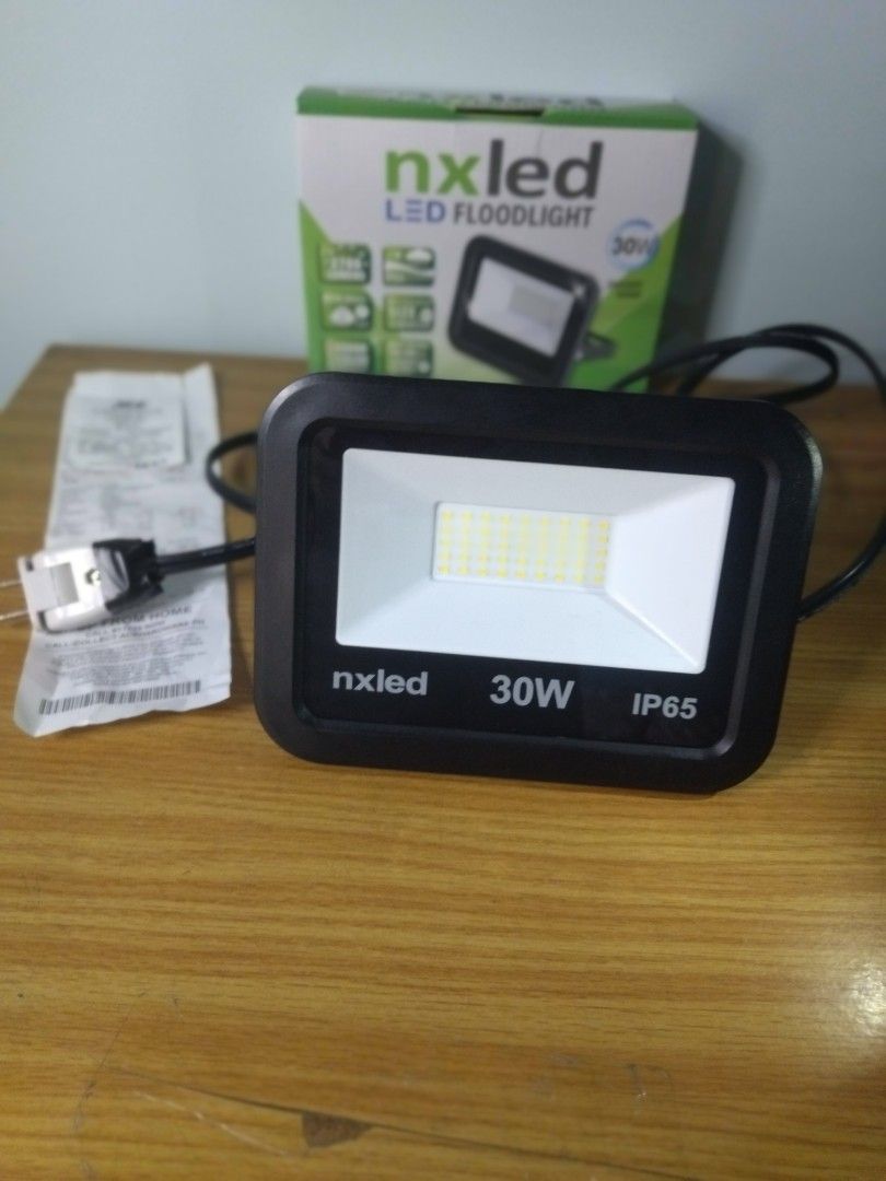Nxled LED Floodlight 30W IP65 Daylight 6500K (Category: Lighting) located in Quezon City. Submitted by starapplenaynten (Listing ID 1465273750, Image 3). Description: Nxled 30W LED Floodlight (2,700 Lumens) Converted to Plug-In with Cord & Fresh Warranty. Newly bought last September 30, 2026(check the receipt) I am offering a brand-new Nxled 30W LED outdoor floodlight (Model: ANXFL-D30DL) that delivers a potent 2,700 lumens of crisp daylight illu