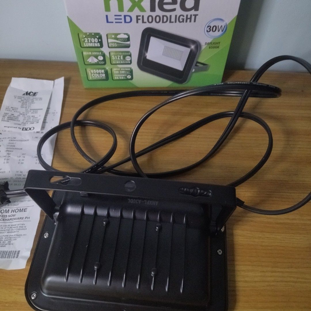 Nxled LED Floodlight 30W IP65 Daylight 6500K (Category: Lighting) located in Quezon City. Submitted by starapplenaynten (Listing ID 1465273750, Image 2). Description: Nxled 30W LED Floodlight (2,700 Lumens) Converted to Plug-In with Cord & Fresh Warranty. Newly bought last September 30, 2026(check the receipt) I am offering a brand-new Nxled 30W LED outdoor floodlight (Model: ANXFL-D30DL) that delivers a potent 2,700 lumens of crisp daylight illu